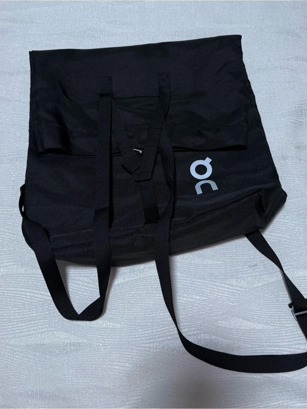 On Running Black Roll-Top Backpack with White Logo